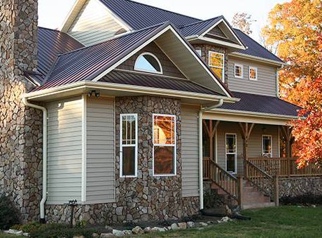 Showing home with gutters